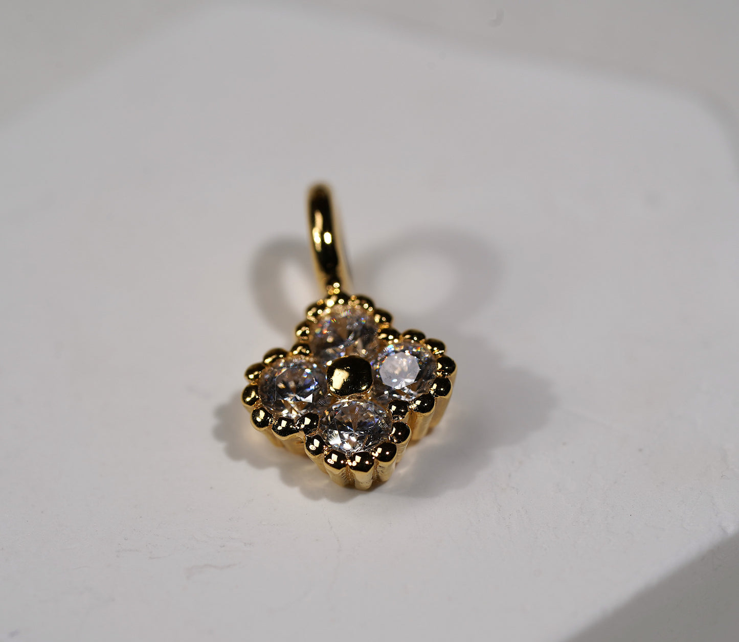 Gold Plated Sterling Silver Flower Pendant with Cubic Zirconia Feature - Griha Threads & Treasure