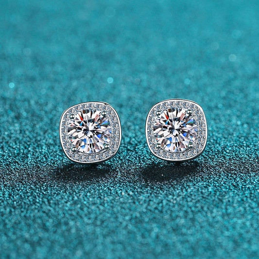 Moissanite four prong encased stud earrings