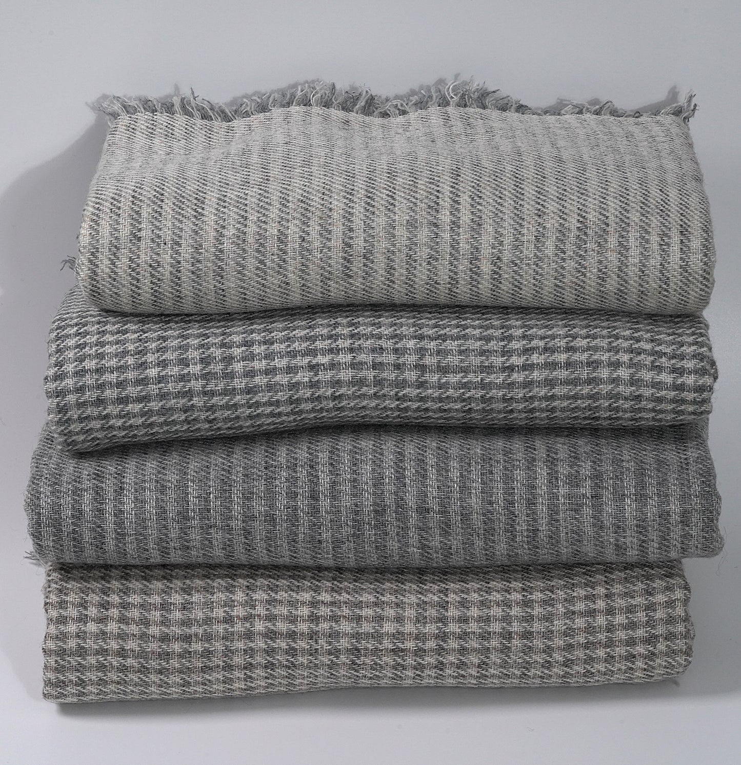 Organic Sheep Wool Shawl Stacked Together in Neutral Colourways