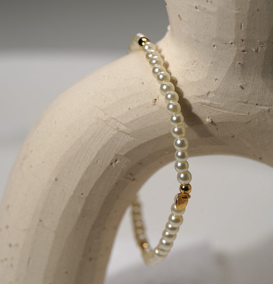 Glass Pearl Elastic Bracelet with Gold Plated Feature - Griha Threads & Treasure