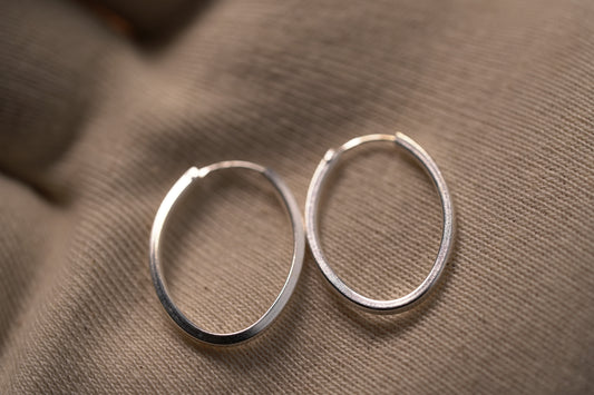 Simple Silver Oval Hoop Earring - Griha Threads & Treasure