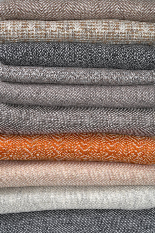 Stack of Thick Style Pashmina Shawls showcasing the different patterns available