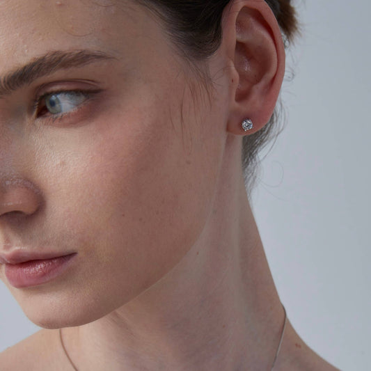four prong moissanite stud earrings