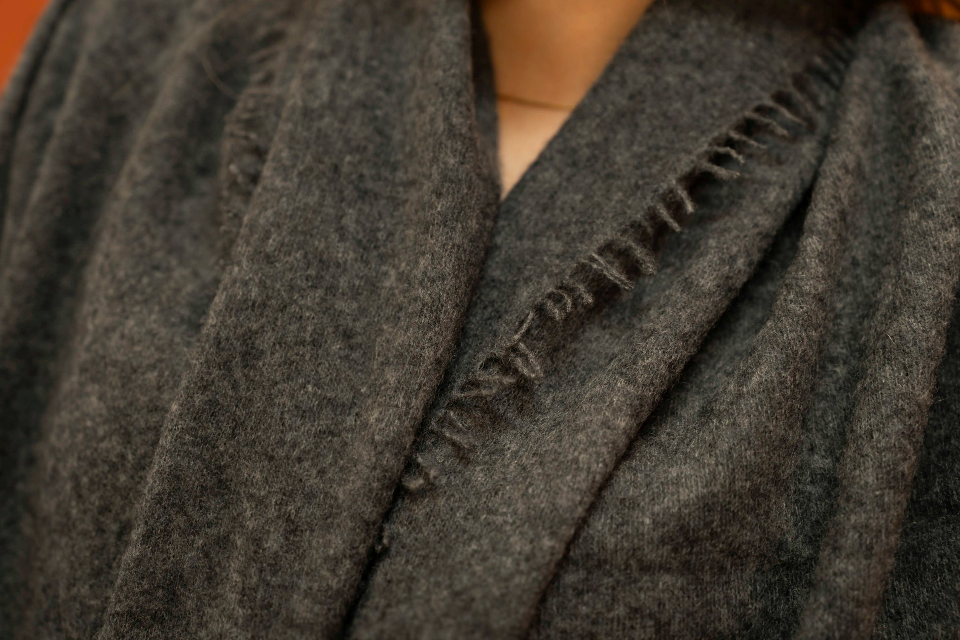 Close-up of charcoal pure woven cashmere shawl showing open weave texture — Griha Himalayan cashmere