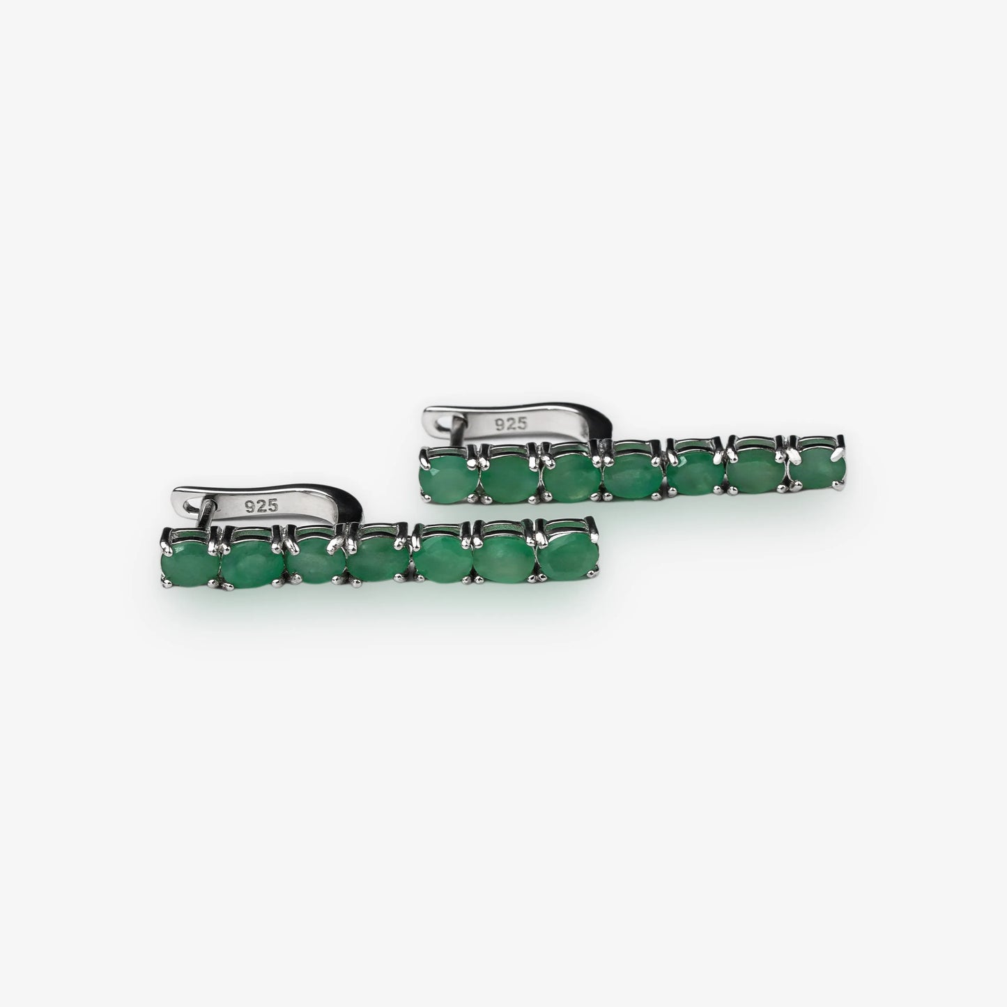 Sterling silver emerald gemstone drop earrings tennis style with hook clasp on white background