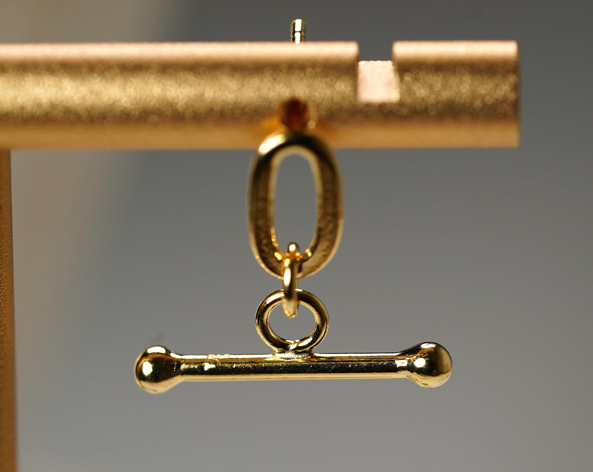 Fashion earring gold plated T-bar