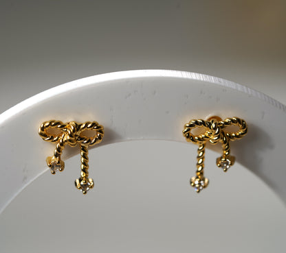Gold Plated 925 Sterling Silver Bow Stud Earrings with cubic zirconia feature