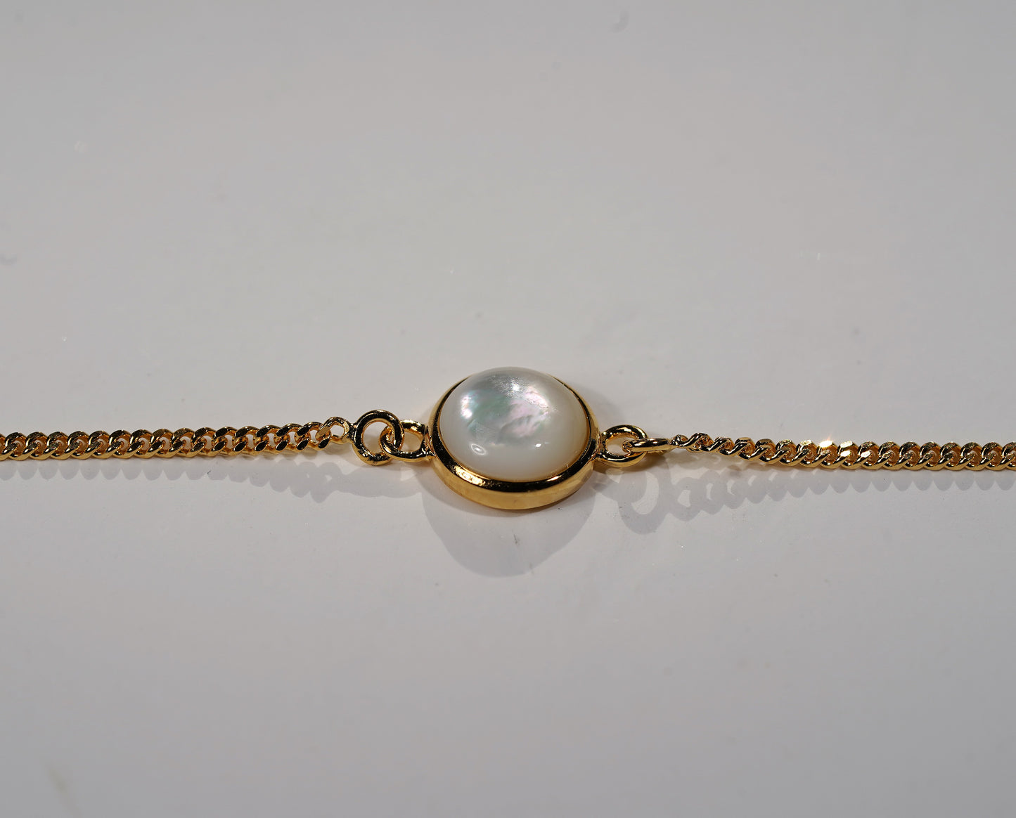 Gold Plated Bracelet Round Stone Feature- white mother of pearl