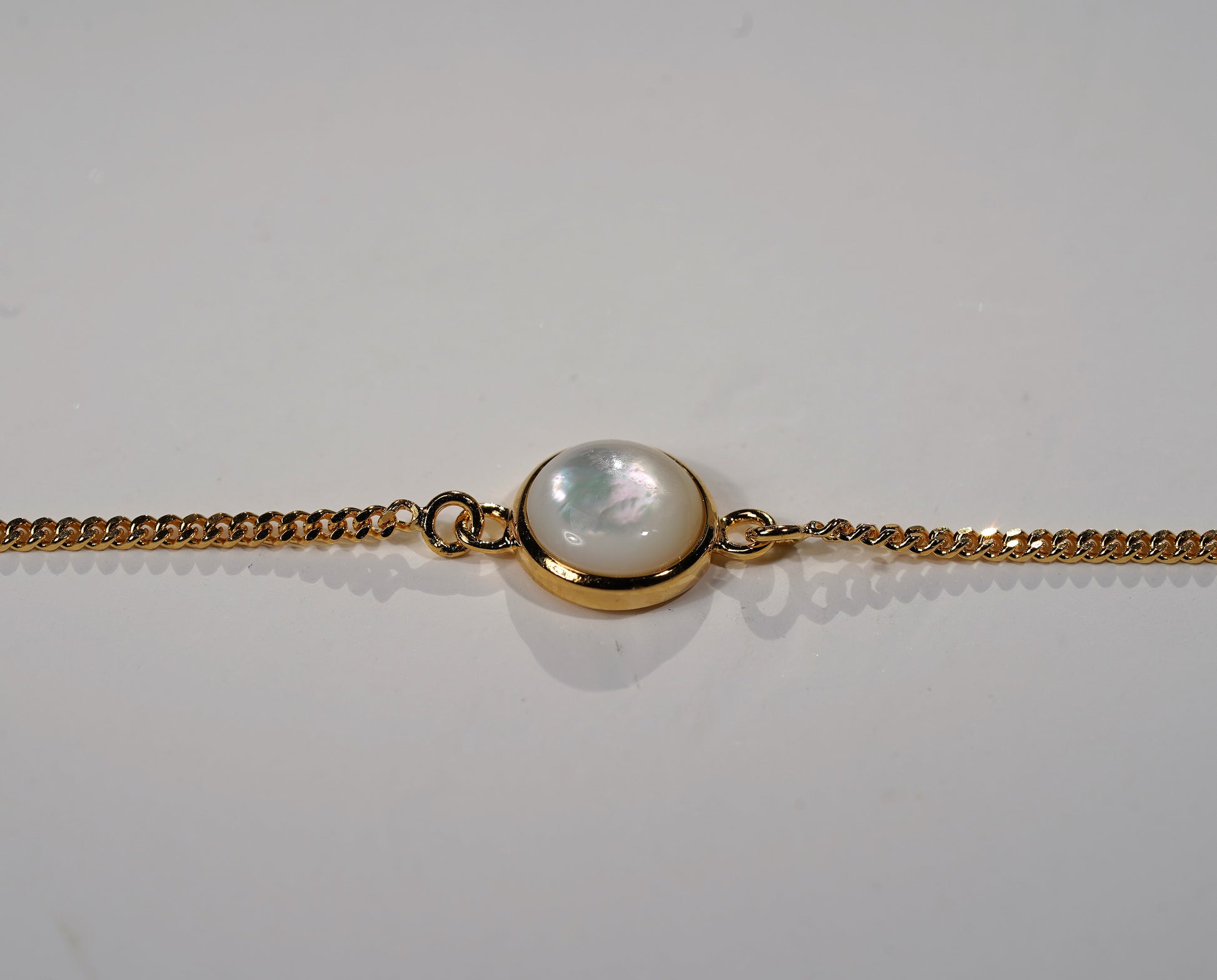 Gold Plated Bracelet Round Stone Feature- white mother of pearl
