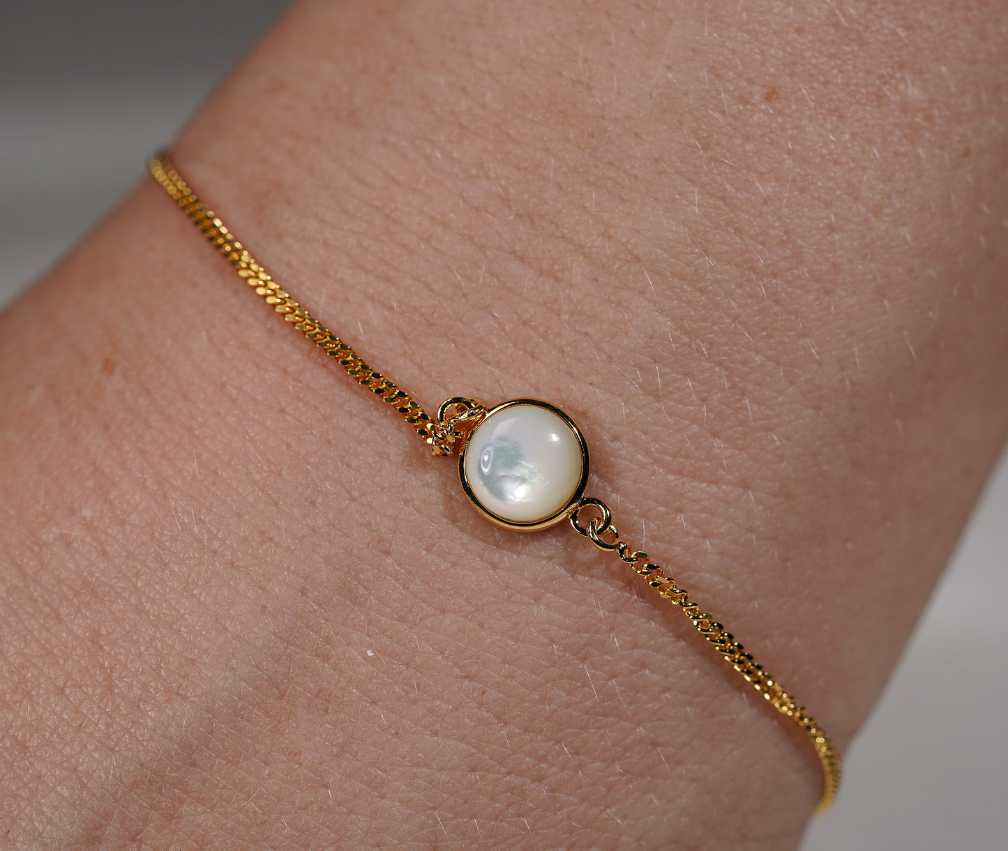 Gold Plated Bracelet Round Stone Feature- white mother of pearl