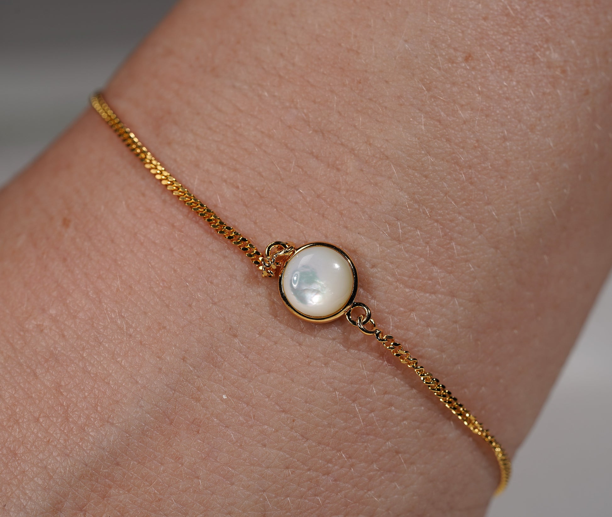 Gold Plated Bracelet Round Stone Feature- white mother of pearl
