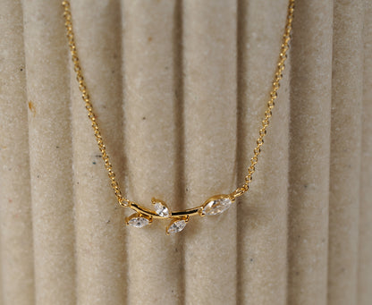 Gold plated branch and leaf necklace with CZ adornment