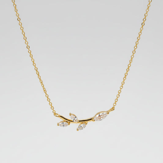 Gold plated branch and leaf necklace with CZ adornment