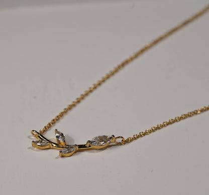 Gold plated branch and leaf necklace with CZ adornment