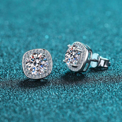 Moissanite four prong encased stud earrings