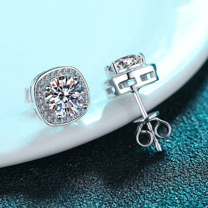 Moissanite four prong encased stud earrings