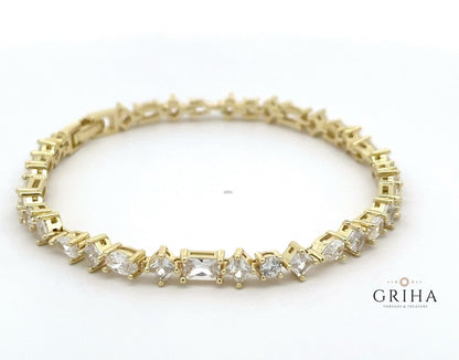 Multi shaped gold plated tennis bracelet