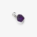 Natural Amethyst cut stone pendant set in sterling silver on white background