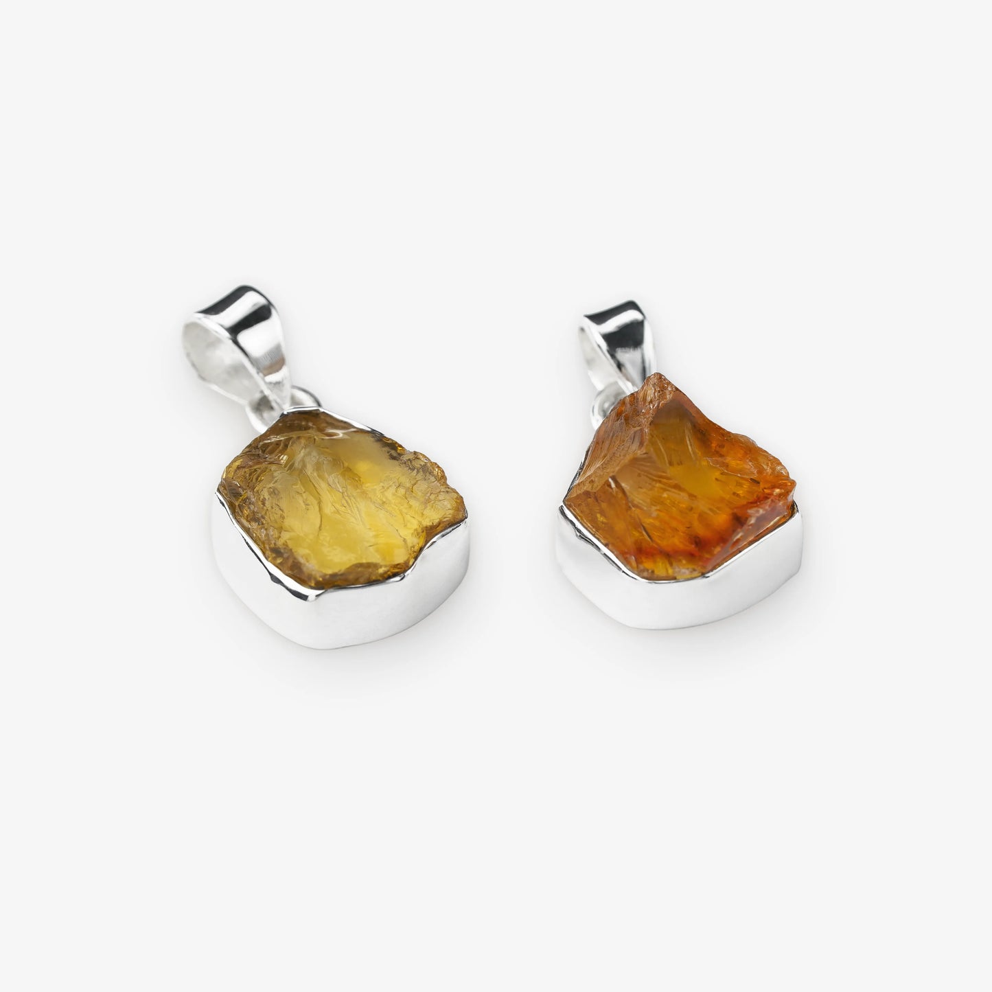 Raw natural citrine gemstone pendants set in sterling silver yellow colour or orange colour