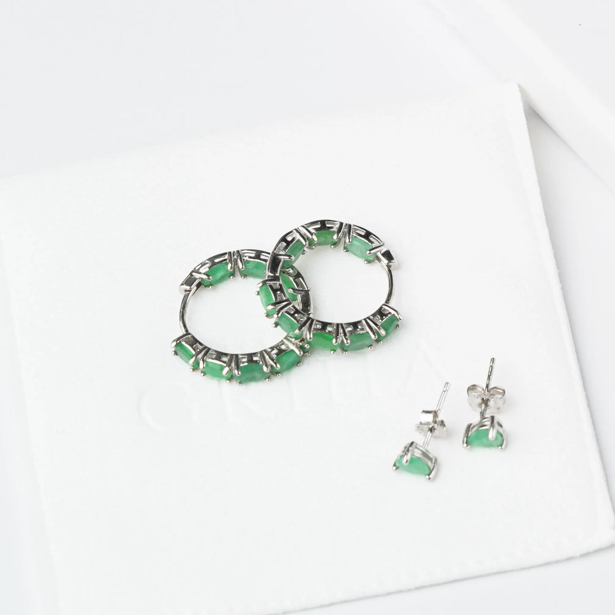 Sterling Silver Natural Emerald  Earrings and stud on a Griha Pouch 