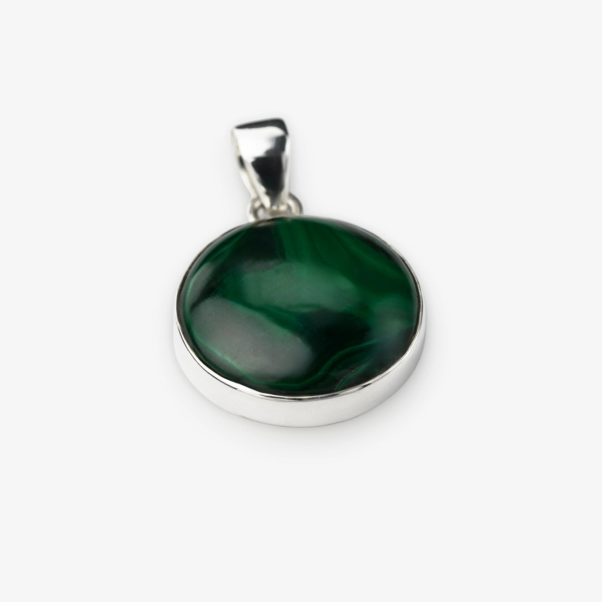 A round silver pendant featuring a polished dark green malachite stone with natural swirling patterns, set in a silver bezel with a silver bail, shown on a light gray background.