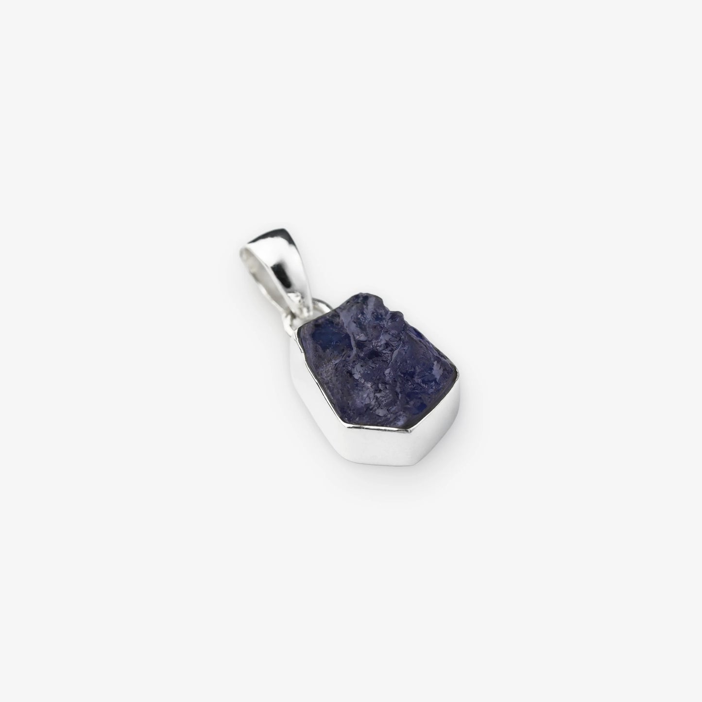 Natural Tanzanite Gemstone pendant blue colour set in sterling silver on white background