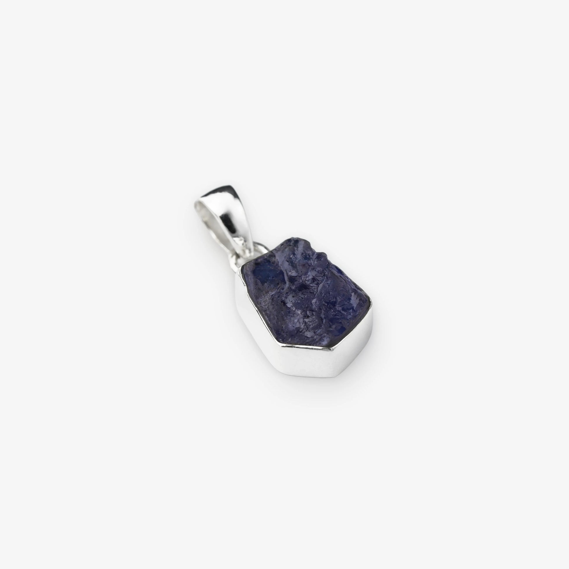 Natural Tanzanite Gemstone pendant blue colour set in sterling silver on white background