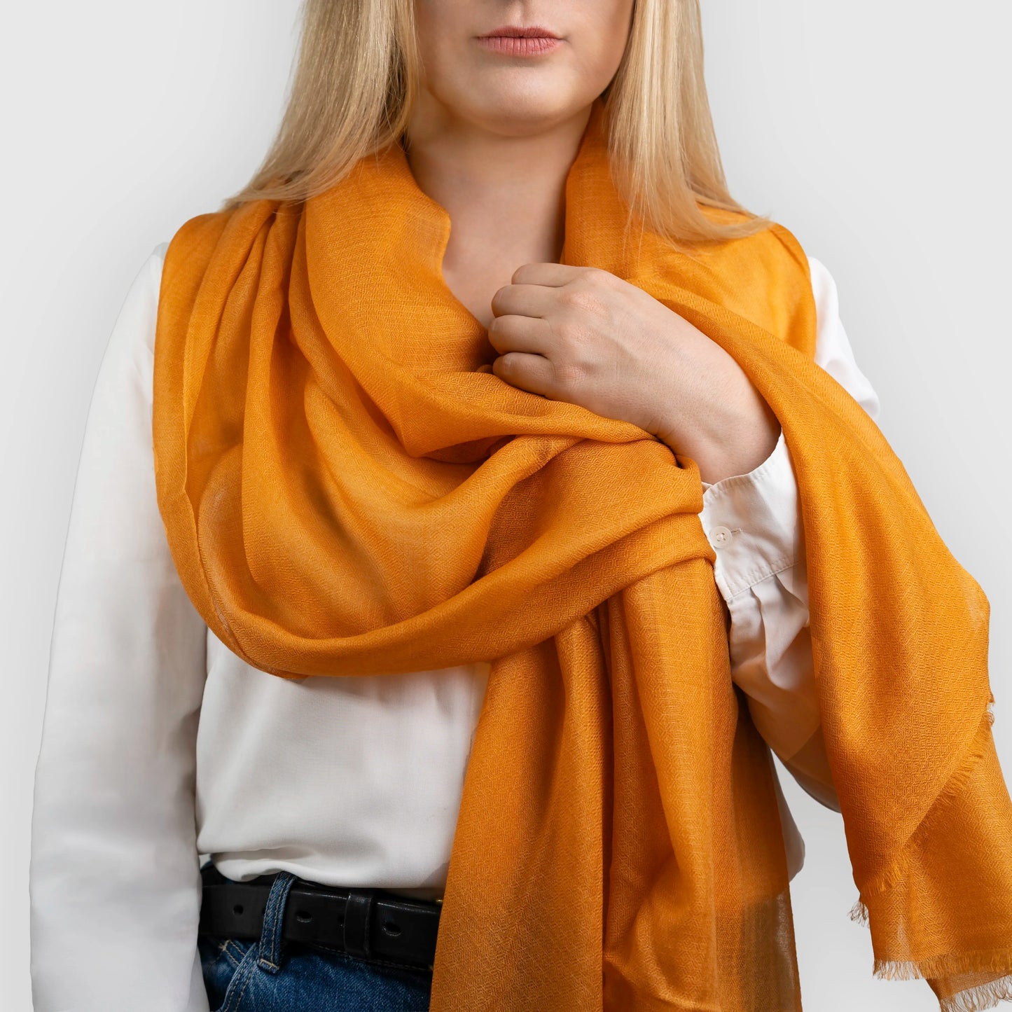 natural orange pashmina shawl scarf model holding 
