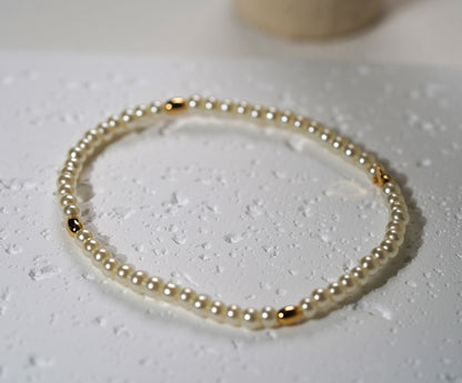 Glass Pearl Elastic Bracelet with Gold Plated Feature - Griha Threads & Treasure