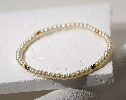 Glass Pearl Elastic Bracelet with Gold Plated Feature - Griha Threads & Treasure