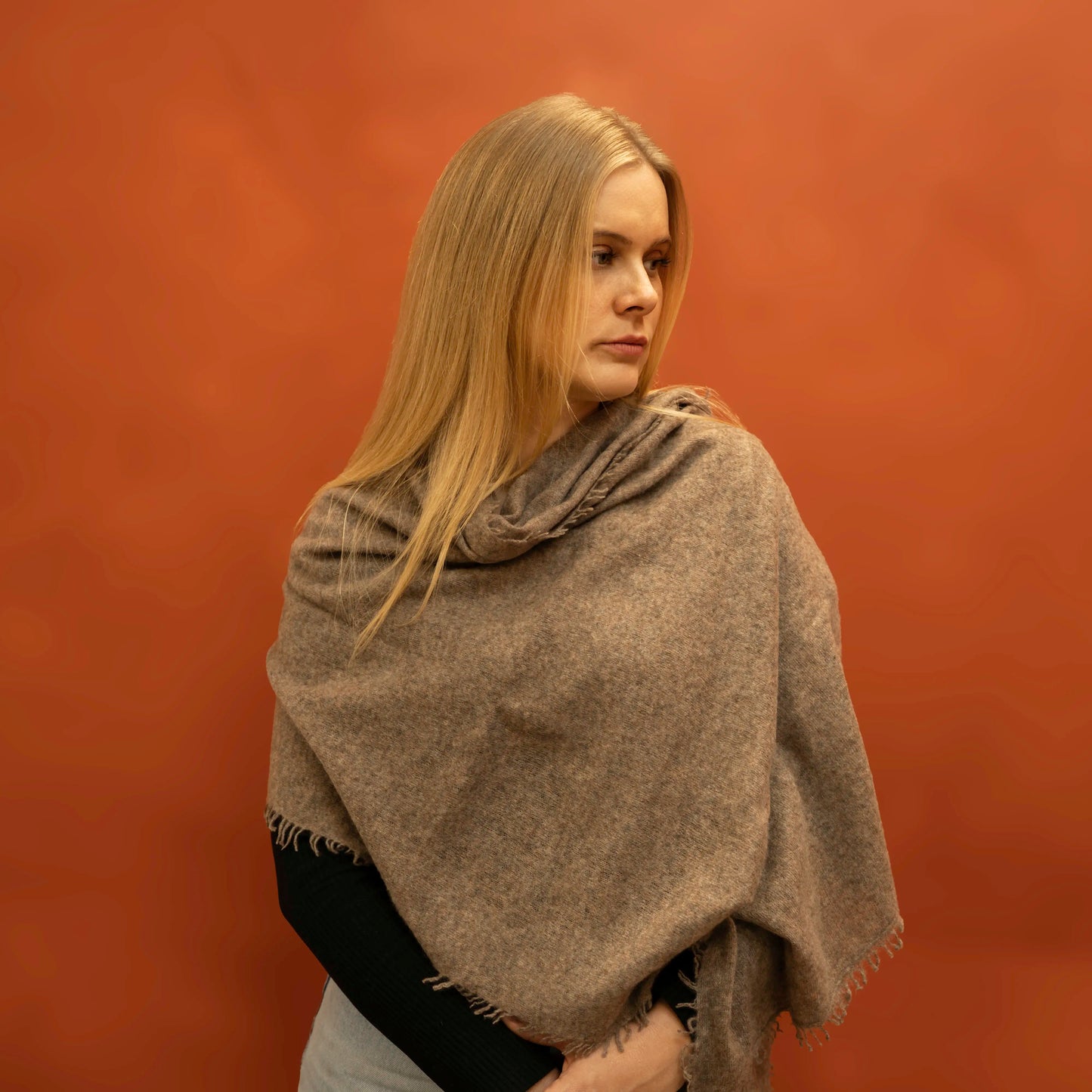 Taupe brown woven cashmere shawl draped as shoulder wrap — handcrafted in Nepal by Griha