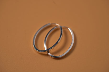 Simple Silver Oval Hoop Earring - Griha Threads & Treasure