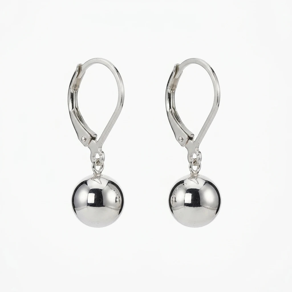 A pair of polished silver leverback drop earrings with smooth, reflective spherical beads hanging from the hooks, shown against a plain white background.