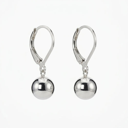 A pair of polished silver leverback drop earrings with smooth, reflective spherical beads hanging from the hooks, shown against a plain white background.
