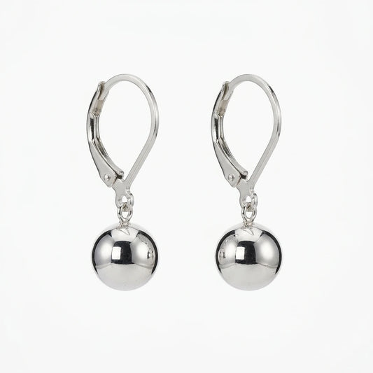 A pair of polished silver leverback drop earrings with smooth, reflective spherical beads hanging from the hooks, shown against a plain white background.