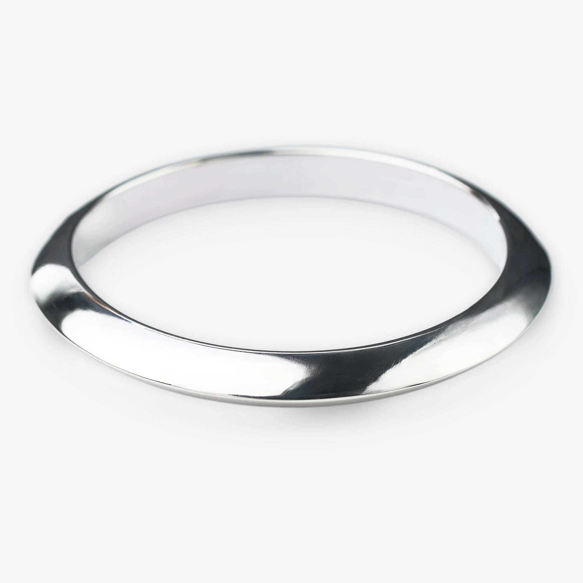 Silver bracelet on a white background concave design