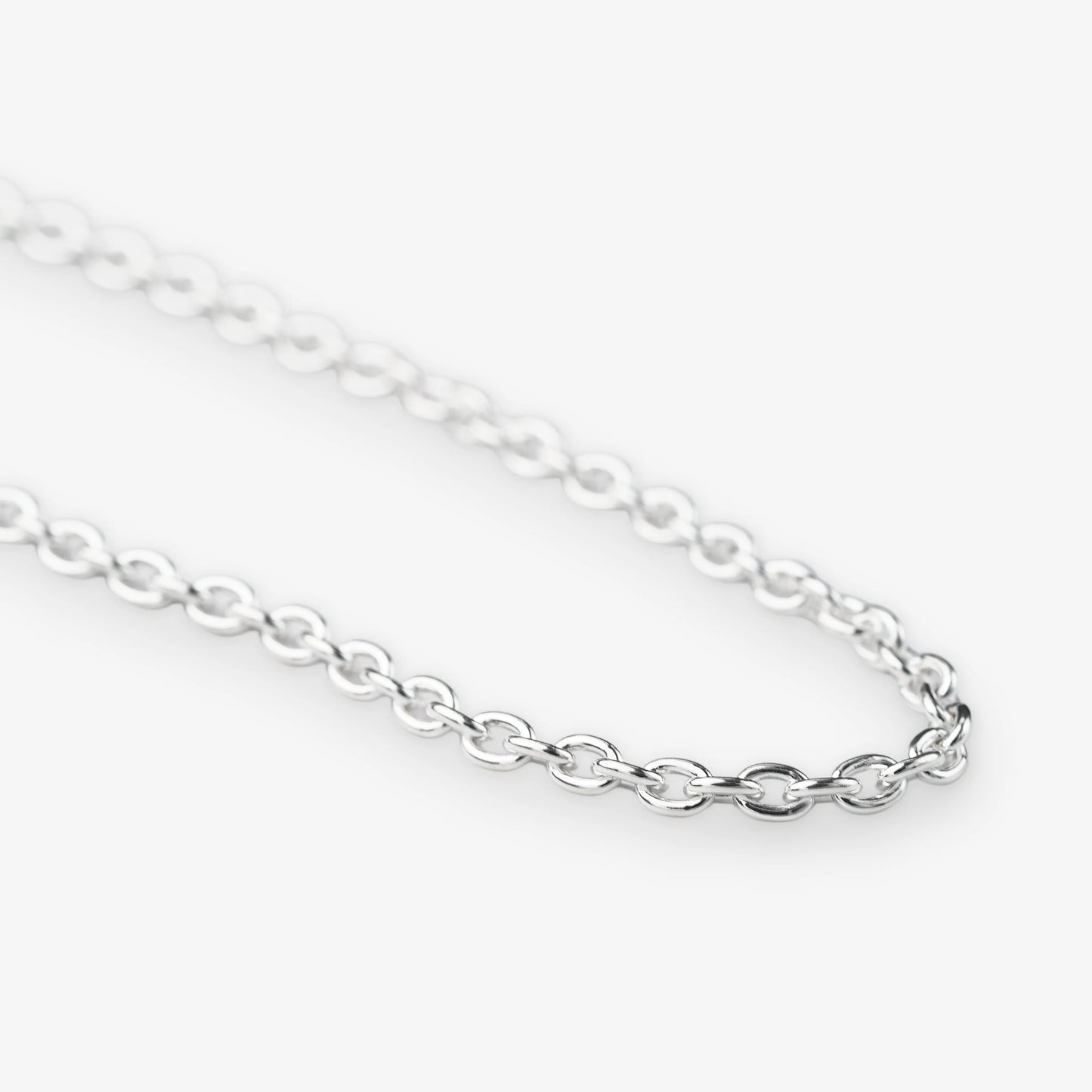 A close-up of a polished silver belcher chain necklace with oval links, shown against a clean white background.