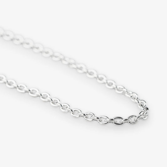 A close-up of a polished silver belcher chain necklace with oval links, shown against a clean white background.