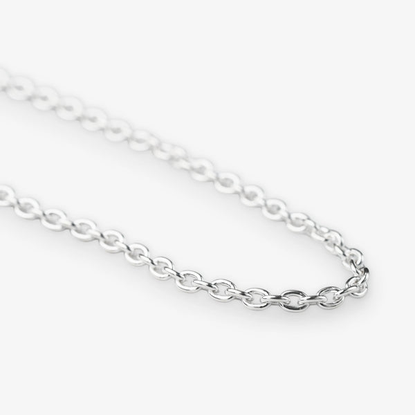 A close-up of a polished silver belcher chain necklace with oval links, shown against a clean white background.