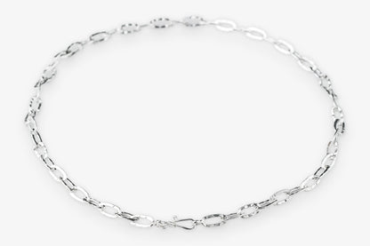 Silver paperclip chain necklace on a white background