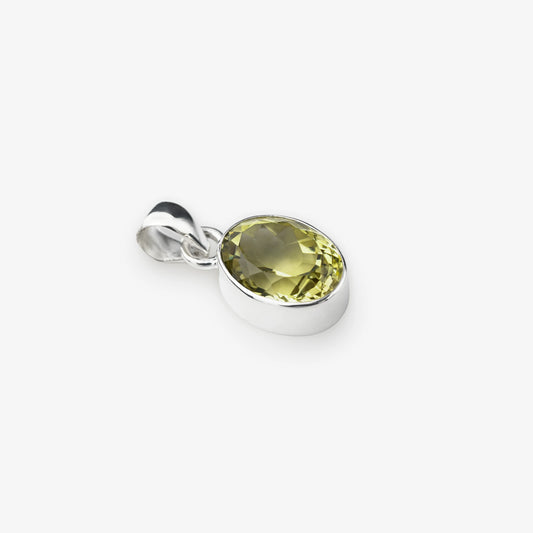 Silver pendant with a yellow lemon quartz gemstone on a white background