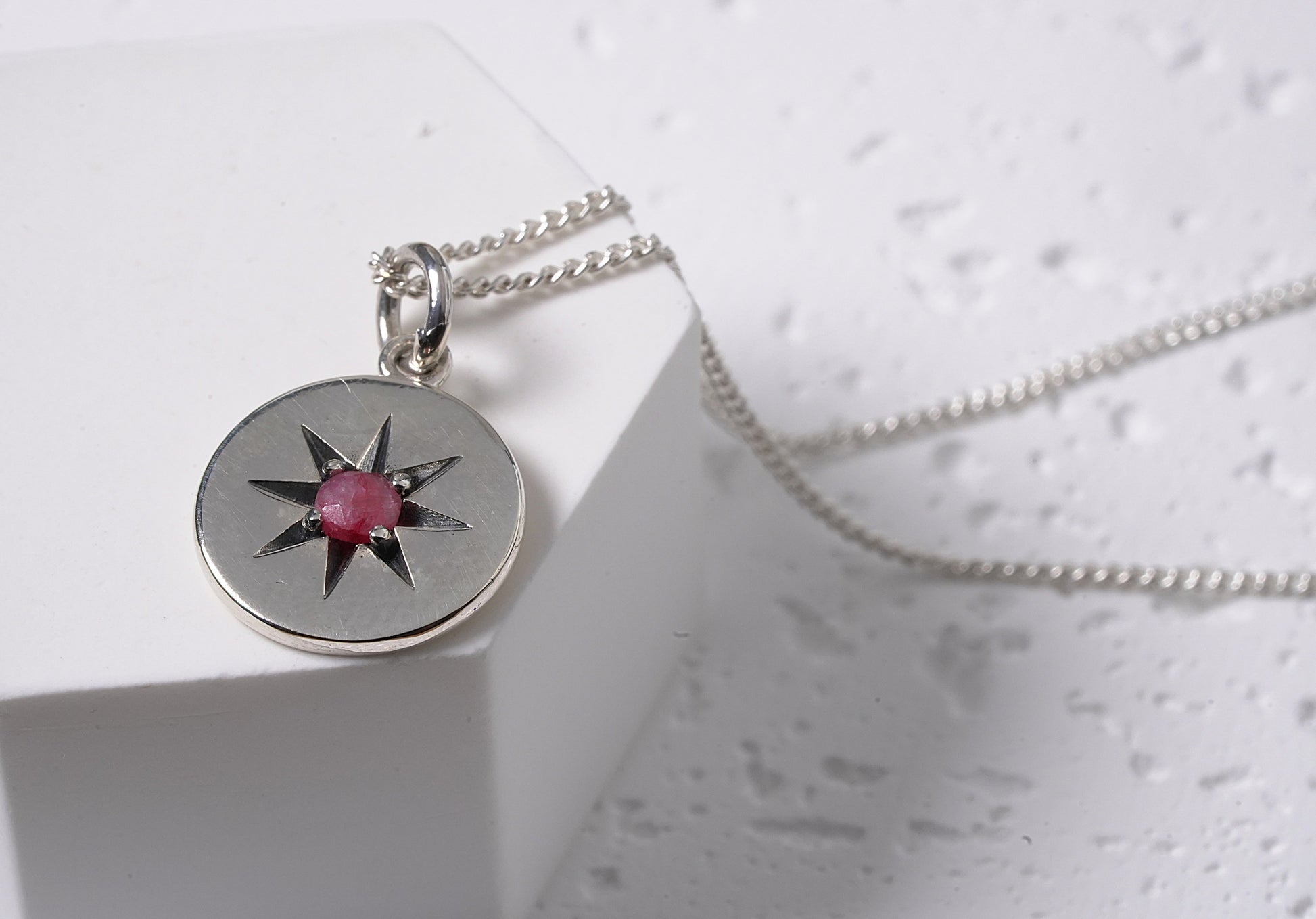 Sterling Silver Circle Pendant with Engraved Star and Natural Red Onyx Stone