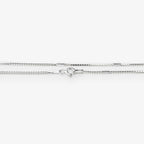 A silver-toned chain necklace with a lobster clasp, shown horizontally against a plain white background.