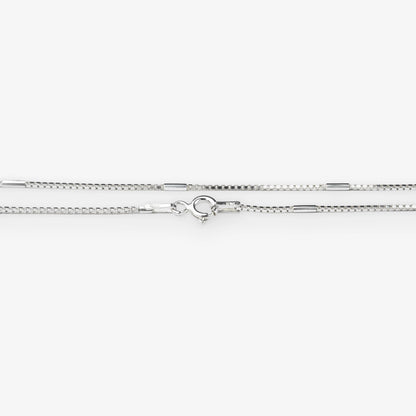 A silver-toned chain necklace with a lobster clasp, shown horizontally against a plain white background.
