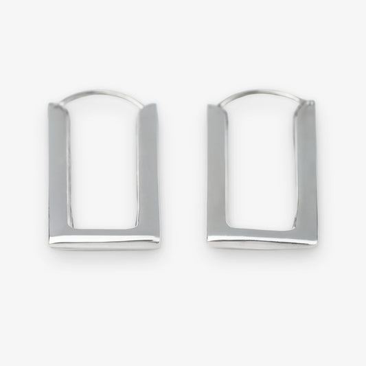 A pair of sterling silver geometric hoop earrings with a modern, open rectangular arch design, displayed on a clean white background.