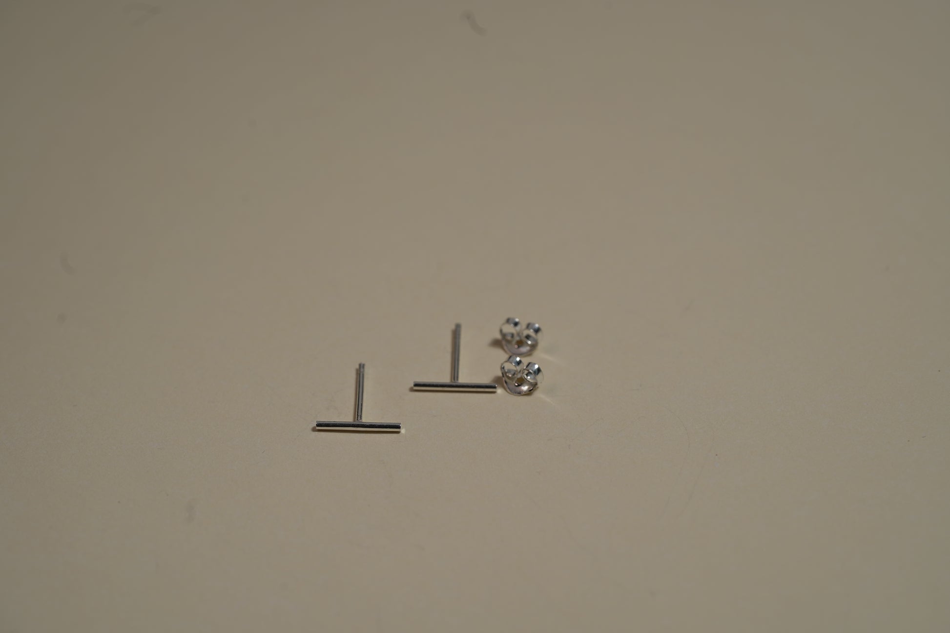 Thin T Shape Stud Earring - Griha Threads & Treasure