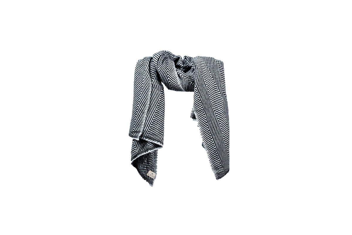 Black and white patterned scarf on a white background