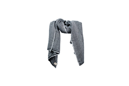 Black and white patterned scarf on a white background