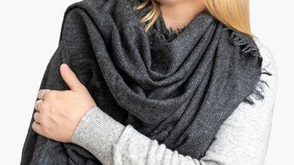 Charcoal Pure Yak Wool Shawl with Griha label showing 100% yak wool, made in Nepal